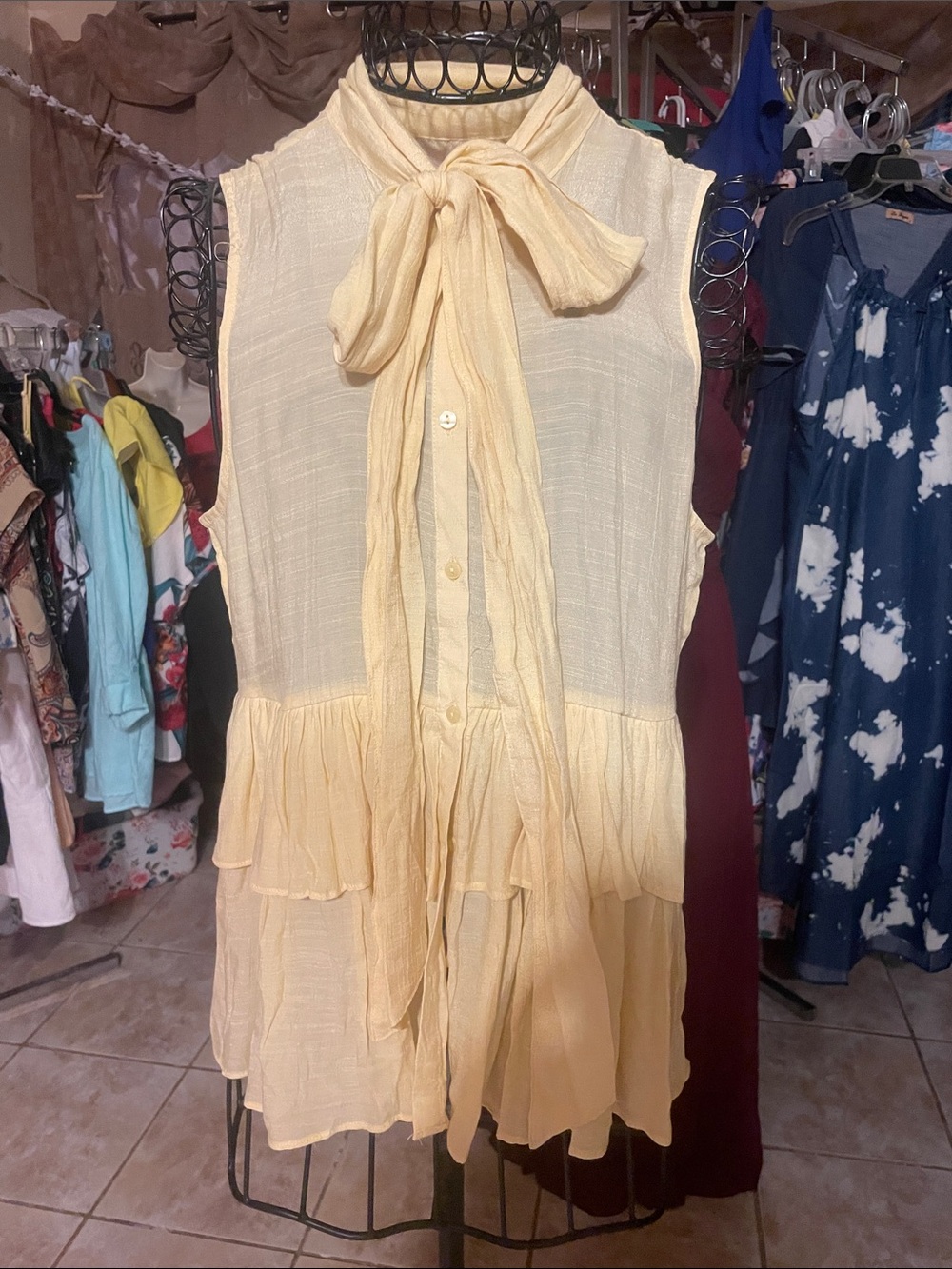 Sleeveless Yellow Tie-Neck Ruffle blouse